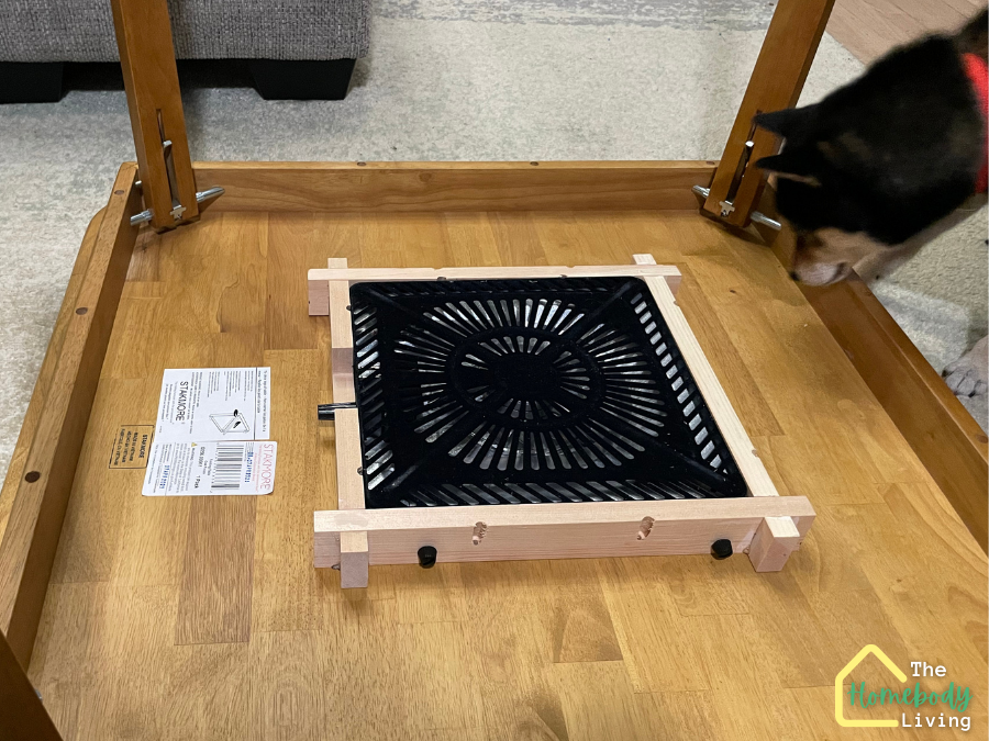 Install the heater under the table